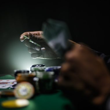 selective focus photography of poker chips