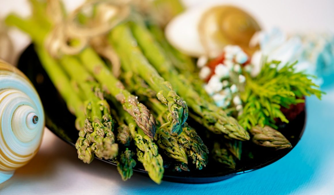 green vegetable on blue ceramic plate