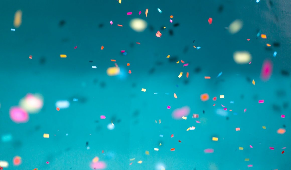 selective focus photography of multicolored confetti lot